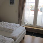 1tes Schlafzimmer mit Balkon 10-29-28